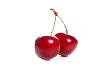 Juicy cherries with leaf isolated on white background