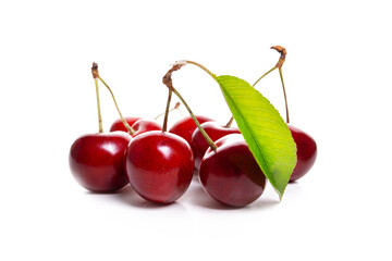 Fresh cherries with leaf isolated on white background