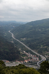 Landscape of the highway crossing the green mountains in the north of Spain.