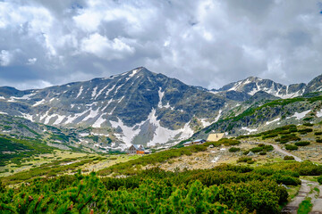 Cloudy Snowy Mountain Landscape in Summer 2