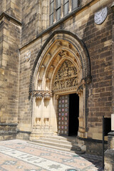 Fototapeta na wymiar Entrance to the Minor Basilica. Historic Church Doors.