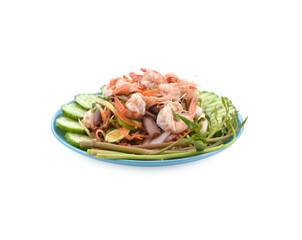 Papaya salad in a plate on a table.