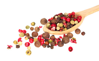 A mixture of peppers in spoon isolated on white background