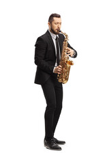 Elegant man in a suit playing a saxophone