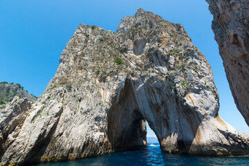 The Faraglioni of Capri are famous because the couples has to kiss by passing trought it.