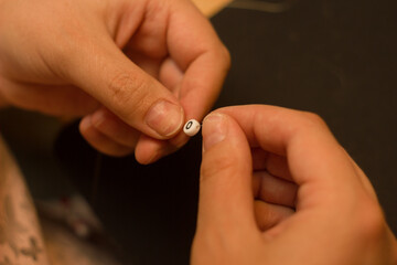 Creating handmade jewelry.