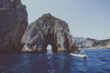 View of Capri with the amazing Faraglioni.