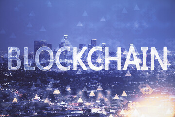 Multi exposure of cryptocurrency theme hologram drawing and city veiw background. Concept of blockchain and bitcoin.