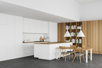 White kitchen corner with table and bookcase
