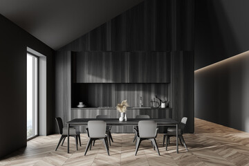 Grey and wooden attic kitchen interior with table
