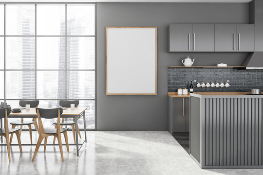 Panoramic grey kitchen with poster and table