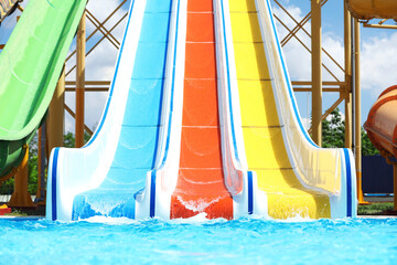 Water park with colorful slides. Summer vacation