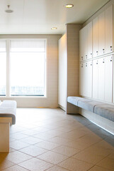 Male Changing or locker room inside fitness center and spa on modern Norwegian cruiseship or cruise...