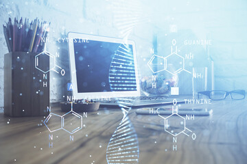 Desktop computer background and DNA drawing. Double exposure. Science concept.