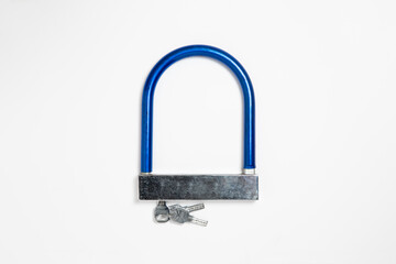 New metal padlock with key isolated on white background.High-resolution photo.Top view.
