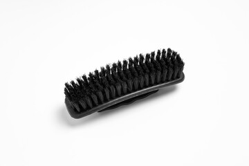 Clothes brush isolated on white background. High-resolution photo.