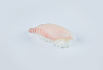 Japanese Nigiri sushi with raw rockfish fillet. sashimi with rice, isolation on white background. Japanese cuisine. Pan Asian menu dish isolated.
