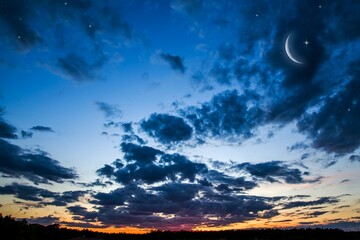 Ramadan background with a crescent and sunset sky .  beautiful dawn in the morning