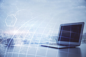 Multi exposure of table with computer and world map hologram. International data network concept.