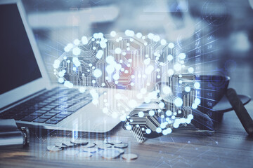 Multi exposure of work table with computer and brain hologram. Brainstorm concept.