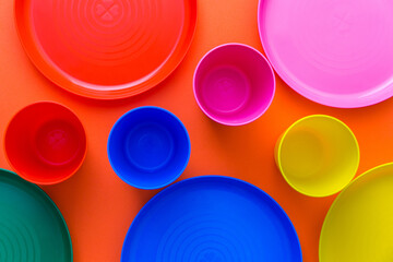 Children's unbreakable multicolored dishes, serving for a children's holiday