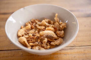 Streaky pork with crispy crackling  in bowl