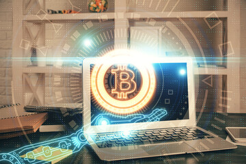 Multi exposure of blockchain theme hologram and table with computer background. Concept of bitcoin...