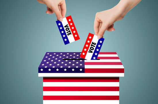 US Elections Concept : Hand holding and putting voting paper in ballot voting box with USA flag symbol.