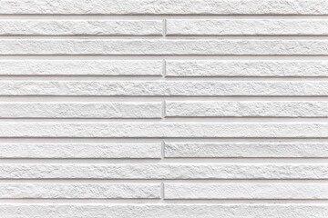 Modern white stone wall with stripes texture and seamless background