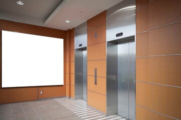 Blank billboards attached to the lift entrance hall