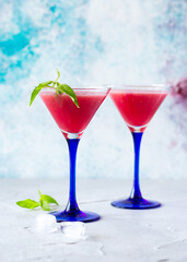 Watermelon smoothie with mint in glasses, summer refreshing drink