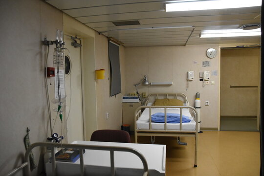 Hospital On The Ship With Two Beds Inside The Superstructure Of The Merchant Container Vessel. Used For Treatment Of The Crew In Emergency Cases.