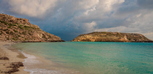 Fototapeta na wymiar Crystal clear water at the pristine Rabbit’s beach (spiaggia dei conigli) in Lampedusa, Pelagie islands, Sicily