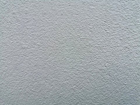 Grey on concrete wall surface.
