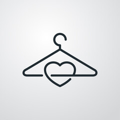 Concepto tienda de ropa. Logo lineal percha y corazón en fondo gris