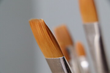 synthetic-tipped paint brushes
