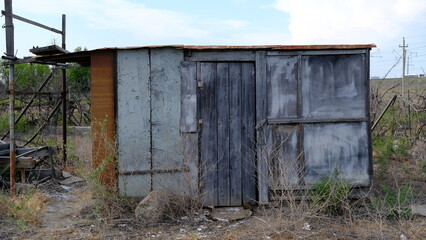 Fototapeta na wymiar Abandoned houses on personal plots in Russia.