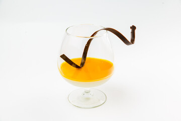 North-Italian dessert Panacota in a glass on a white background