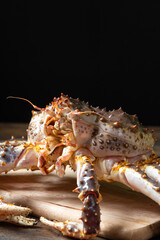 Kamchatka crab. King raw crab on the kitchen table. Kamchatka crab is on the table. Cooking process