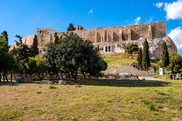 Fototapeta na wymiar Panoramic view of Acropolis hill walls with Parthenon Athena temple seen from Theatre of Dionysos Eleuthereus ancient Greek theater in Athens, Greece