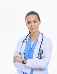 Fototapeta premium Beautiful young woman in white coat posing with hand in pocket. Woman doctor