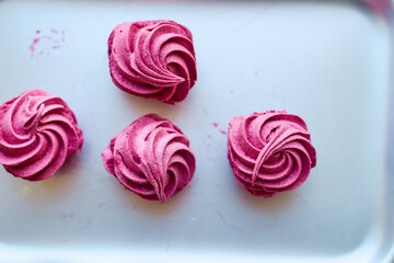 Homemade pink marshmallow from fresh berries top view vegan food