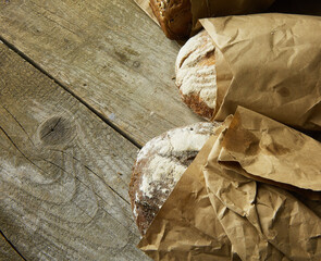 Composition of various breads, on wooden background