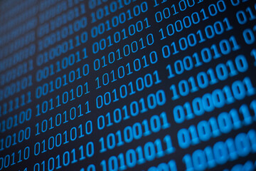 Binary code on detail pixelated screen in blue