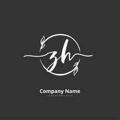Z H ZH Initial handwriting and signature logo design with circle. Beautiful design handwritten logo for fashion, team, wedding, luxury logo.