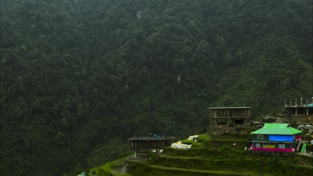 Time-lapse of rain covering the small hamlet town named Zuluk, located at the height of around 10000ft on the rugged terrain of the lower Himalayas in East Sikkim, India shot in 4k.