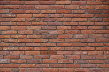 Brick wall texture. Red brick. Soft lighting.
