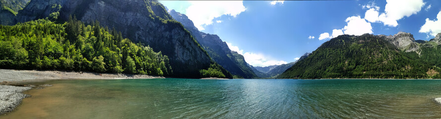 Naklejka na ściany i meble Swiss mountains and Lake. Scenic Alps and lane view. Trekking an