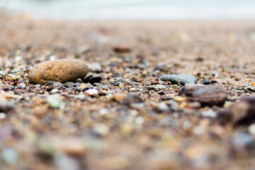 a small rock found in a sand dune.