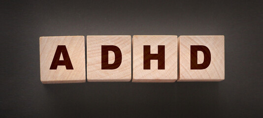 ADHD - medical concept. Attention deficit hyperactivity disorder. Wooden cubes